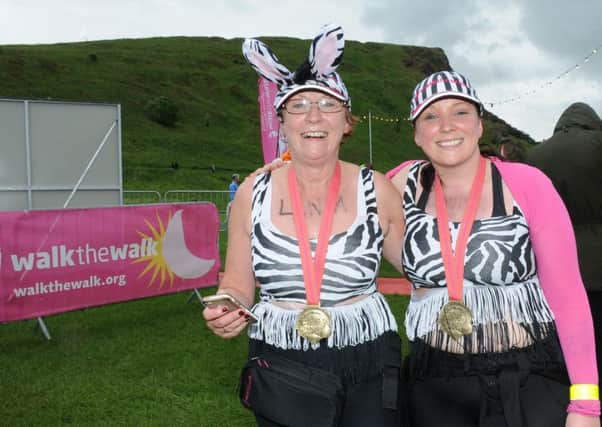 Dynamic duo...Linda Anderson and her daughter Louise Mackie at the end of one of their 15 marathons for Walk the Walk since 2006. (Contributed pic)