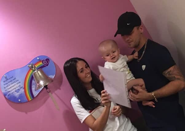 Harley Shevill with her parents Coral and Graeme