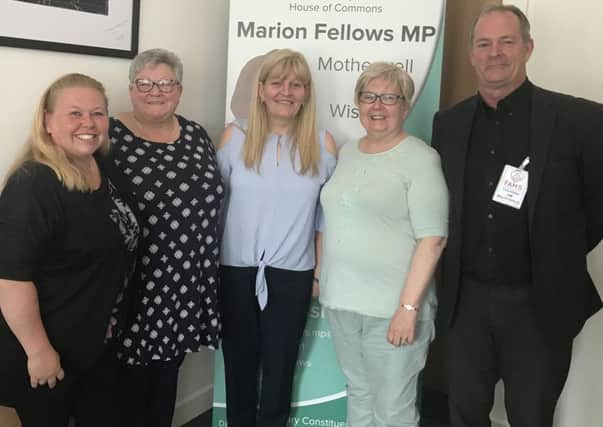 Wishaw councillor Fiona Fotheringham and Motherwell and Wishaw MP Marion Fellows (second, right) with (l-r) Pamela Porter, Grace ONeil and Jim McDonald from FAMS