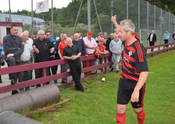 Rob Roy boss Stewart Maxwell shows his appreciation for the club supporters after the final home match of the season against Glenafton