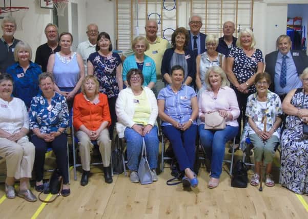 The former classmates are pictured during their reunion at Kirkton Primary School.
