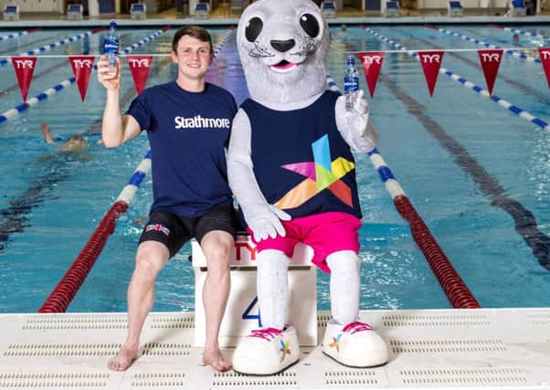 Ross and official mascot Bonnie the Seal launch the partnership between Strathmore Water and Glasgow 2018.