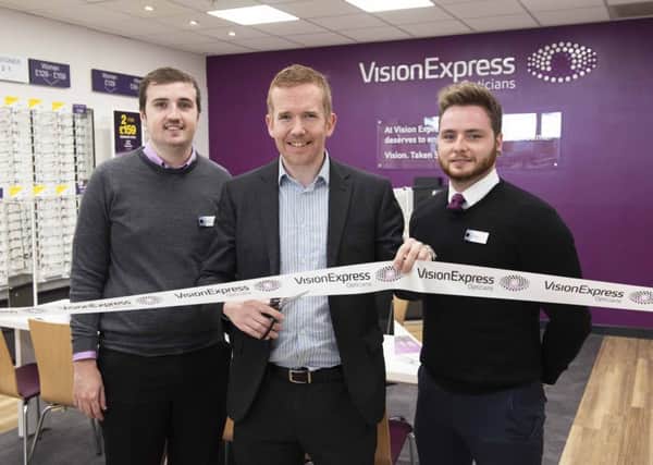 Stuart McDonald MP (centre) with Vision Express at Tesco Cumbernauld optical assistants Ryan McGuckin (left) and Grant Hutchison. Pic: Mark Anderson/Vision Express