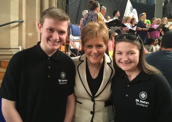 Fraser and Eilidh Simpson with First Minister Nicola Sturgeon