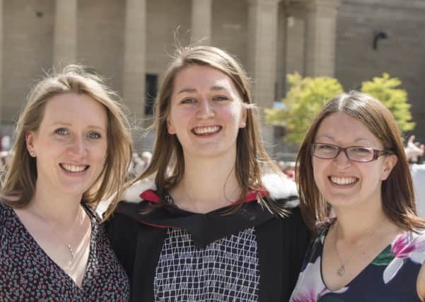 Kirsty Brown (centre) flanked by her two other sisters.