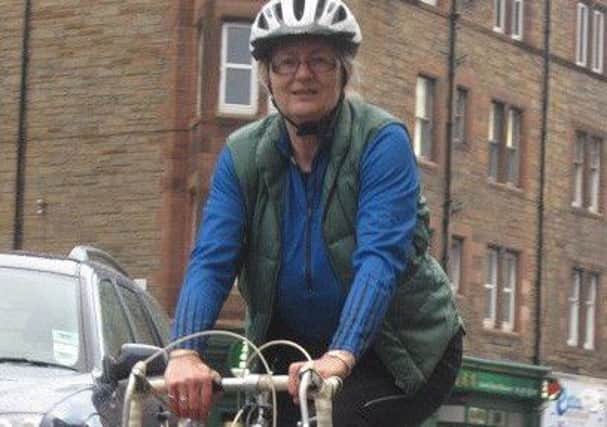 MSP Claudia does her bit to fight pollution by cycling to work
