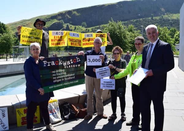 Fracking petition with 3,000 signatures handed over to Green MSP Mark Ruskell at the Scottish Parliament.