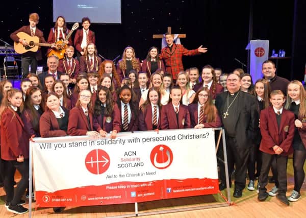 The choir and band from Taylor High s choir and band were among those who sold in solidarity with persecuted Christians around the globeACN's Scottish Youth Rally 2018, at Motherwell Concert Hall, Monday 18th June 2018.
Photo by and copyright of Paul Mc Sherry ACN.

Taylor High School Choir