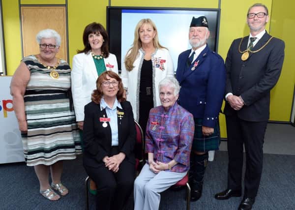 Pictured at the presentation of British Empire Medals are (standing l-r) North Lanarkshire provost Jean Jones, Veronica McDonald, Lord Lieutenant Lady Haughey, David Start, South Lanarkshire provost Ian McAllan, (seated l-r) Elizabeth Blades and Elizabeth Stoddart