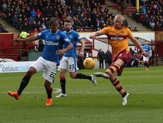 Motherwell's Curtis Main in action against Rangers defender Bruno Alves in the sides' 2-2 draw in their last Fir Park meeting on March 31 (Pic by Ian McFadyen)