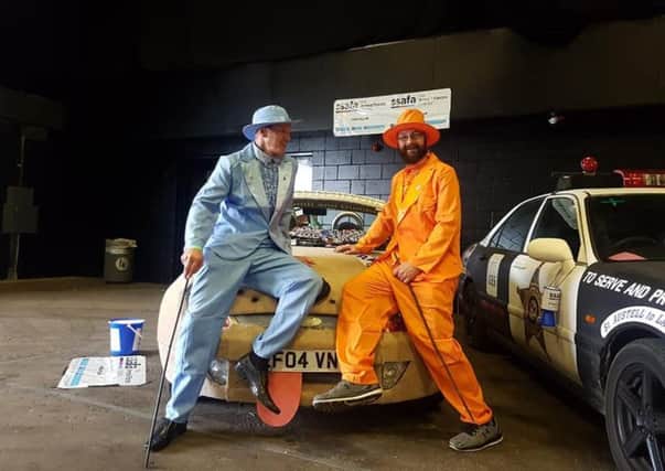 Stewart Lyons and Stephen Daly attending the Scottish Car Show with their Dumb and Dumber inspired car