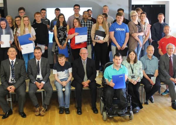 The young achievers are pictured at the presentation ceremony with local councillors.