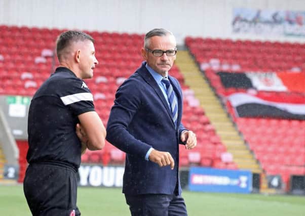 Danny Lennon and assistant Allan Moore are hoping to plot a path to promotion in the months ahead