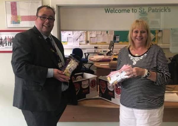 Kilsyth councillor Mark Kerr delivered filled pencil cases for every primary school pupil in his ward during the 'Write from the Start' campaign'