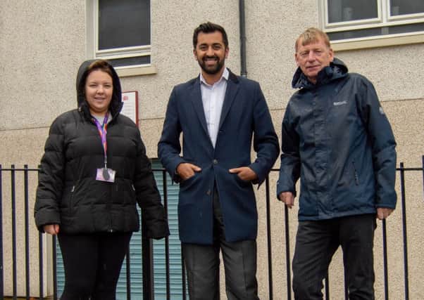 From left: Clare Young, youth worker, Humza Yousaf MSP and Jonny Hendry, youth worker.