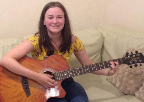 Caitlin Agnew performs at the Voodoo Rooms in Edinburgh later this month, she took up the guitar after being shown a few chords by her grandad Jim
