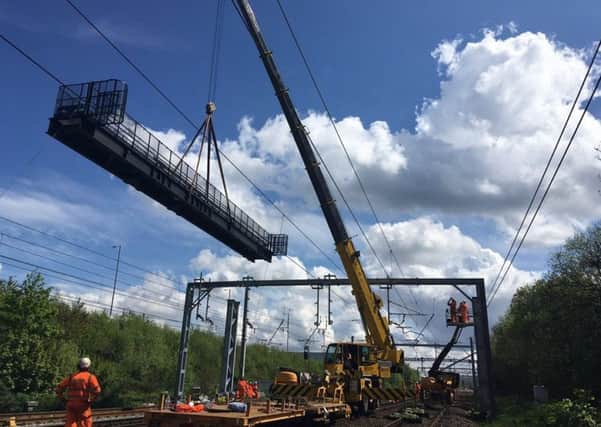 The Motherwell North Signalling Renewal project is replacing track side equipment and transferring control of systems from Motherwell Signalling Centre to the West of Scotland Signalling Centre in Glasgow. Pic: Network Rail