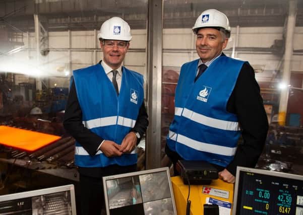 Derek MacKay MSP (left) was given a guided tour of the Dalzell Works by Gordon MacRae. Pic: Lenny Warren