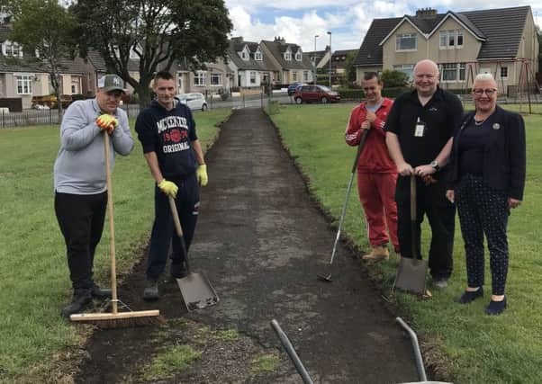 Councillor Agnes Magowan with members of the "RJ part" Group who have been helping with the regeneration of the George Street Park