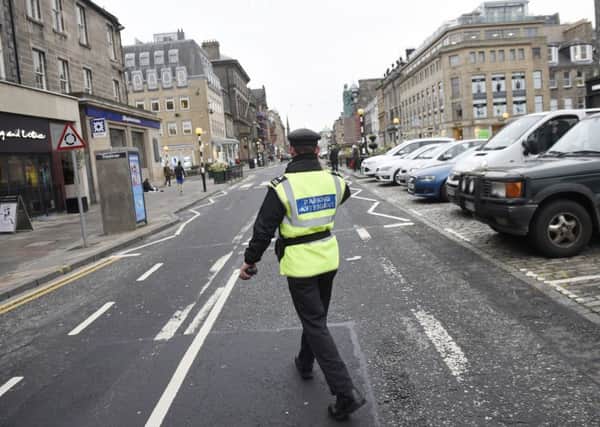 Parking attendents like the ones being introduced in North Lanarkshire have been a common sight on the streets on Edinburgh for some time