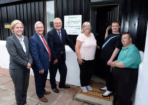 Launch of the Bungalow Project at Watch US Grow (l-r) Emma Walker (NL Leisure), Cllr Tom Fisher (chairman of Watch US Grow), Cllr Jim Logue (leader of North Lanarkshire Council), Ann McCulloch (Watch US Grow), Dylan Farry and James Parks.
