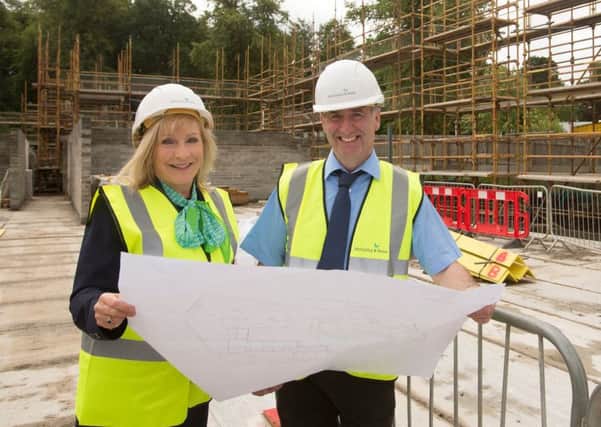Sales consultant Joan MacAulay with site manager Andy Graham.   Photo: Chris Watt