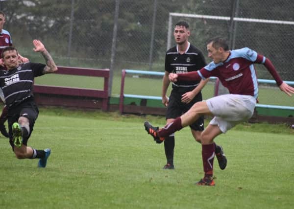 United's Alan Benton shoots for goal against Glencairn (pic by Chloe Kelly)