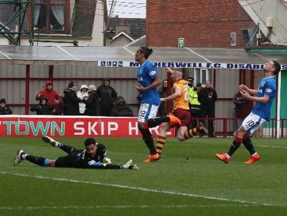 Motherwell's Allan Campbell wheels away to celebrate after scoring in a 2-2 home draw against Rangers last season (Pic by Ian McFadyen)