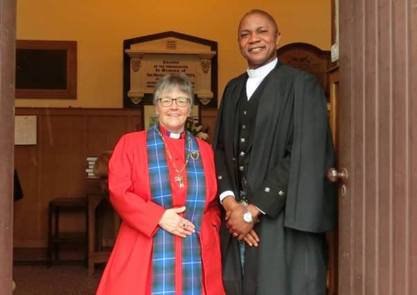 Two in tartan; Moderator Rt. Rev.Brown with St Johns Rev. Dr. Obinna