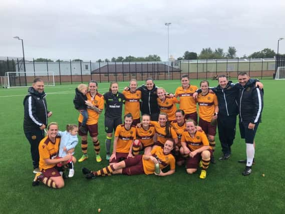 Motherwell Ladies players and management celebrate winning league (Pic by Andy Ross)