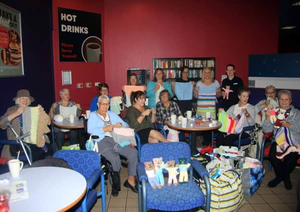 Members of Cumbernauld and Kilsyth Rotary Club visit the 'Club 55' ladies at Gala Bingo to raise awareness of Aquabox
