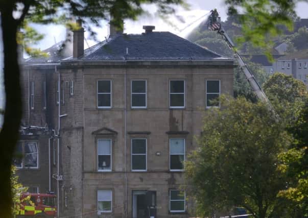 Fighter-fighters attend a major fire at Glasgow Golf Club, one of the oldest and most prestigious in the world, which has gutted most of the building. September 21, 2018.