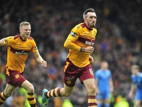 Ryan Bowman celebrates scoring in Motherwell's emphatic 3-0 William Hill Scottish Cup semi-final win over Aberdeen at Hampden Park in April
