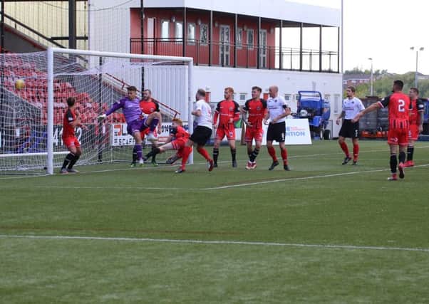 Martin McNiff scores Clyde's third against Elgin (pic by Craig Black Photography)