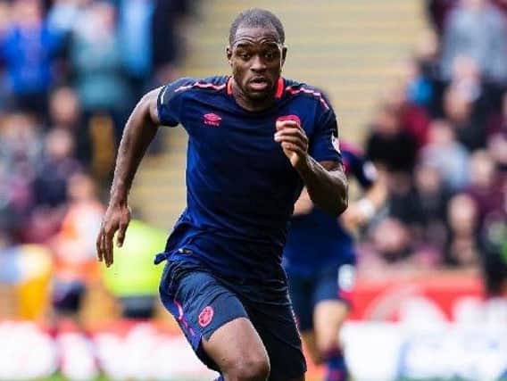 Uche Ikpeazu pictured playing for Hearts at Fir Park on September 15