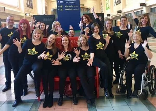 Choir leader Jennifer Sim (pictured back right) with Rock Choir members.