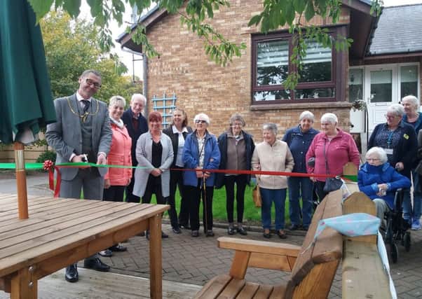 The Provost opens the new outdoor area at Smiddy Court Lanark