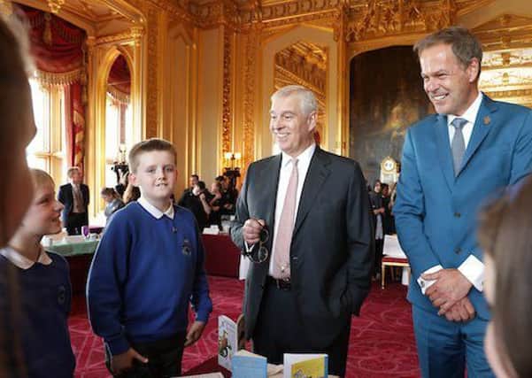 The Prince and Peter Jones meet some of the Biggar team at Windsor Castle