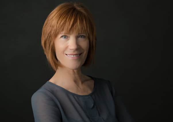 Down to earth...Kiki Dee has kept her feet firmly on the ground, while dipping a toe into Elton John's "crazy" world every now and again!