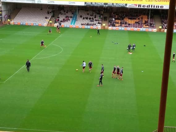 Motherwell and Sligo Rovers players are pictured warming up (Pic by Craig Goldthorp)