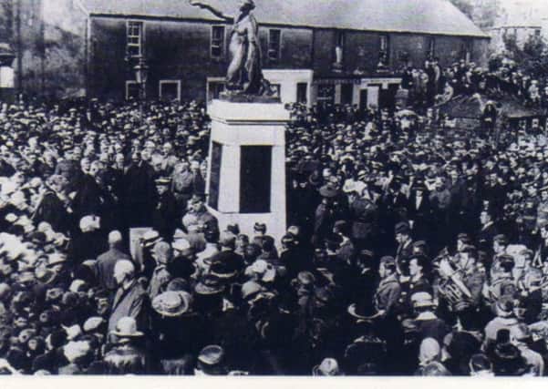 Crowds pack the streets at the unveiling of Milngavie War Memorial in September 1922