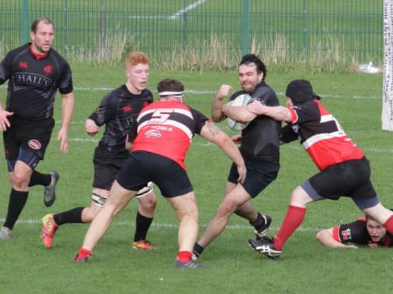 Connor Lavery protecting the ball well as Biggar break out at Lasswade. Connor scored two of Biggars tries in the easy victory. (Pic by Nigel Pacey)