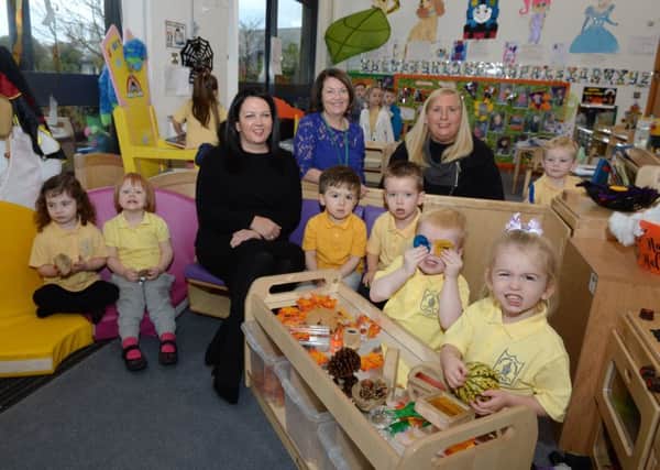 Spaceright sales manager Stephanie Lawrie (left) meets lead early learning practitioner Margaret Mary Murphy (centre), acting depute head Marie Clare Duffy and some of the children from the nursery class at Cathedral Primary