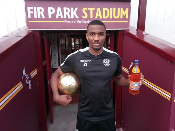 Christian Mbulu with his awards in recognition of his Irn-Bru Cup Player of the Round accolade (Pic by Craig Goldthorp)