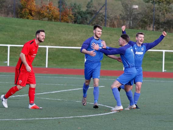 Rovers goal hero Ciaran Lafferty (second from left) celebrates with team-mates Greg Kane and Craig Grierson after the strike which downed Hermes (Pic by Kevin Ramage)