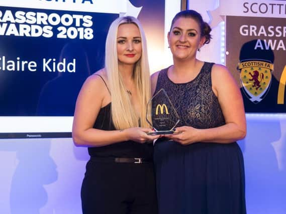 Suzanne Winters (left) presented Mum of the Year award to Claire Kidd at last weeks Scottish FA Grassroots Football Awards at Hampden