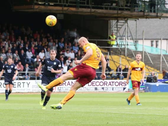 Motherwell striker Curtis Main in action during the 3-1 win at Dens Park earlier this season (Pic by Ian McFadyen)