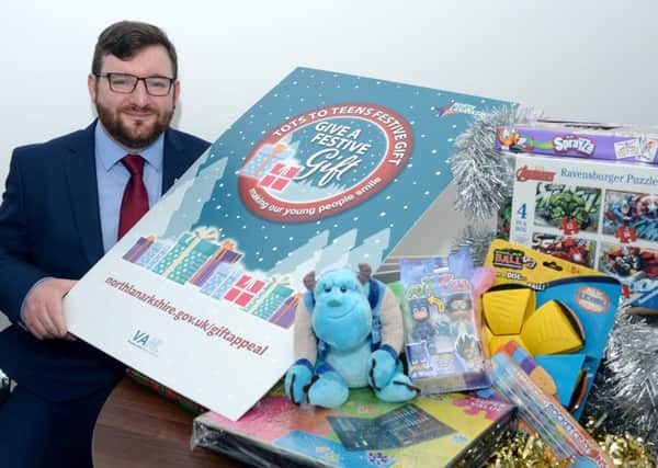 Councillor Paul Kelly launches this years Give a Festive Gift campaign