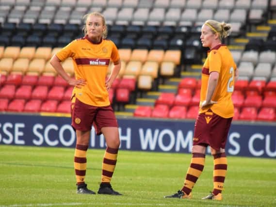 Dejected Motherwell Ladies players Maxine Welsh (left) and Ashley Nicolson pictured after losing SSE Cup final 8-0 to Hibernian Ladies at Firhill on Sunday (Pic by Ben Kearney)