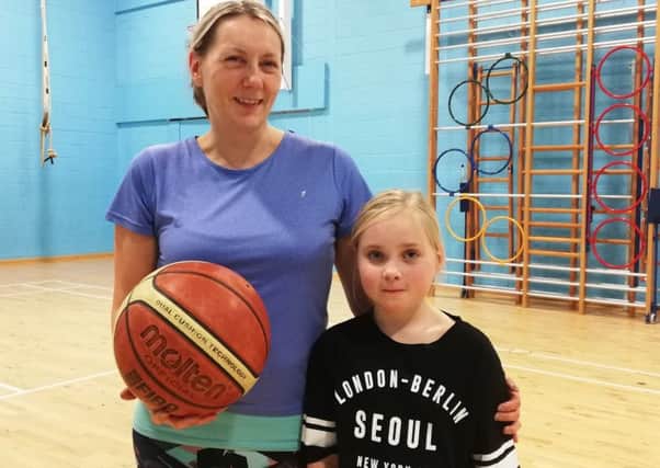 Caroline Wardle with her daughter, Isla, who exercise together at the Active Women and Girls classes.